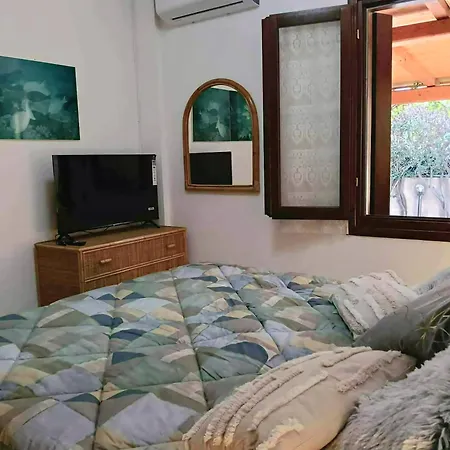Сasa de vacaciones Corinne - Terrazza Privata Fiorita Loiri Porto San Paolo